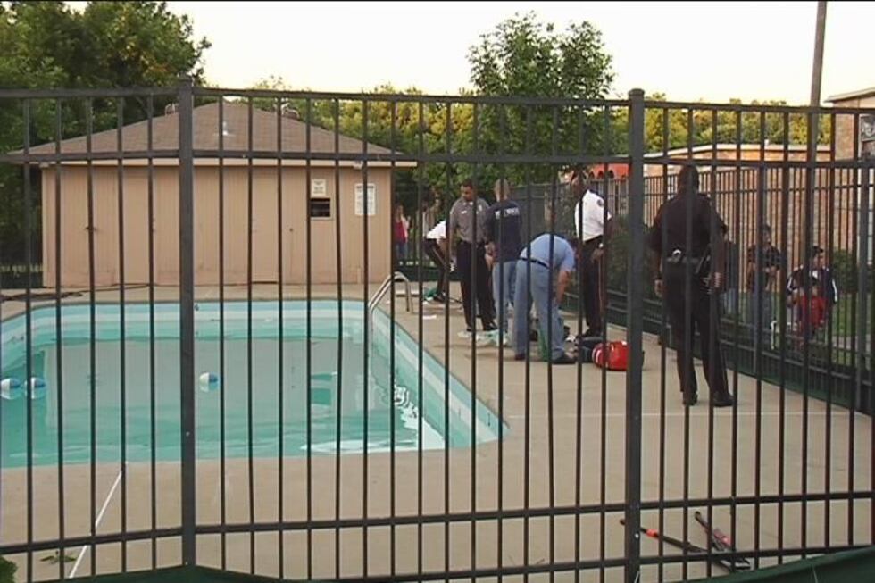 Investigators on the scene of a double-drowning case in Montgomery Monday afternoon.