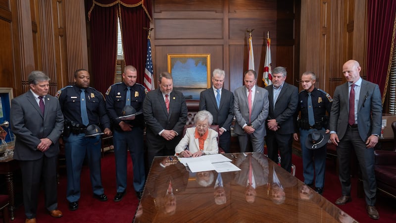 Gov. Kay Ivey signed legislation Wednesday aimed at improving safety on Alabama’s highways.