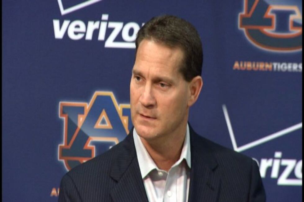Auburn coach Gene Chizik discusses the program during his news conference Tuesday.