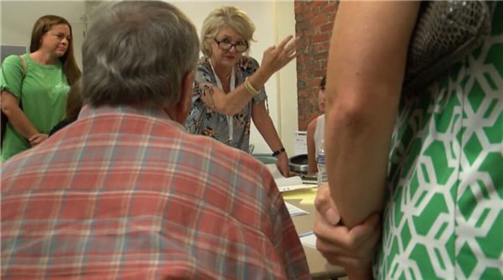 Small groups were formed where community members could discuss what they liked and did not...