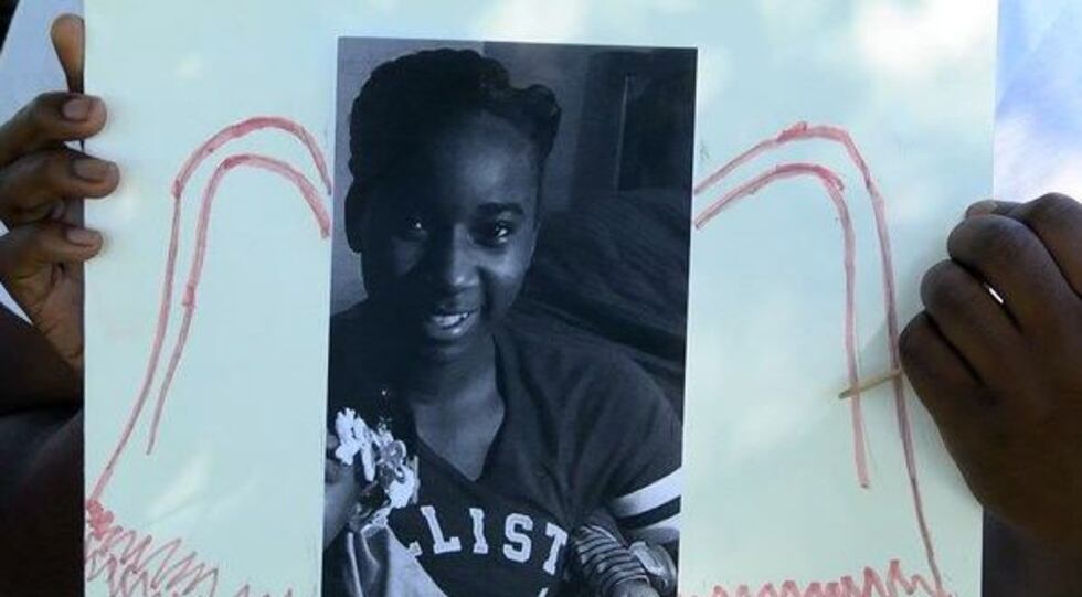 (Source: WSFA 12 News) Family of Jaquerria Timmons held a photo up at the vigil
