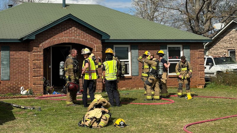 Firefighters on scene of house fire near Prattville High School.