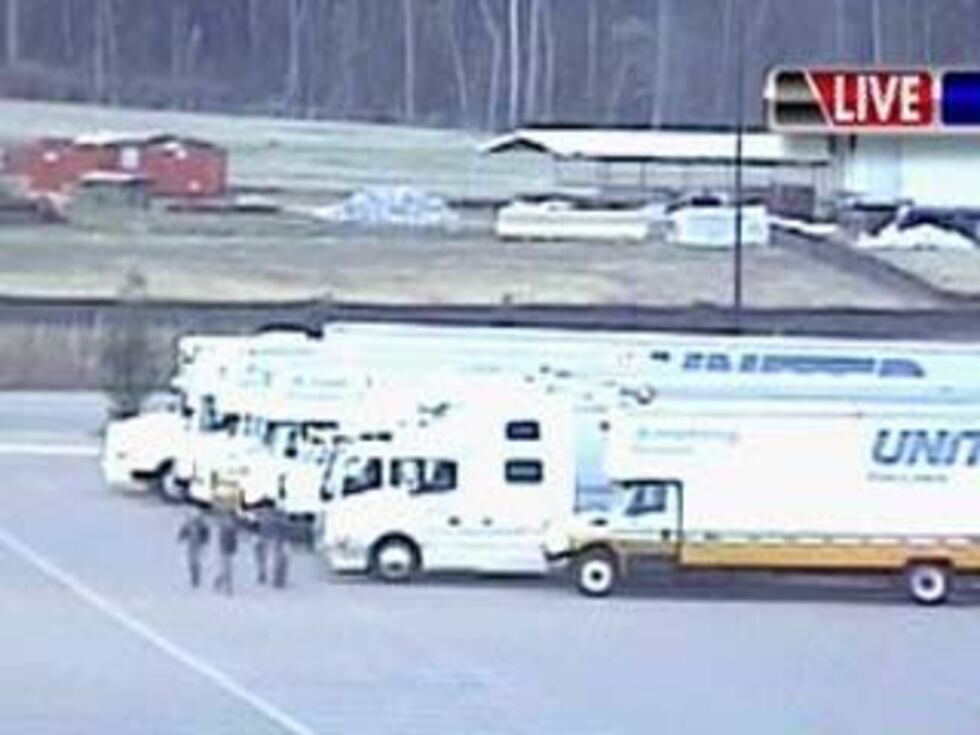 Moving trucks ready to take away thousands of machines