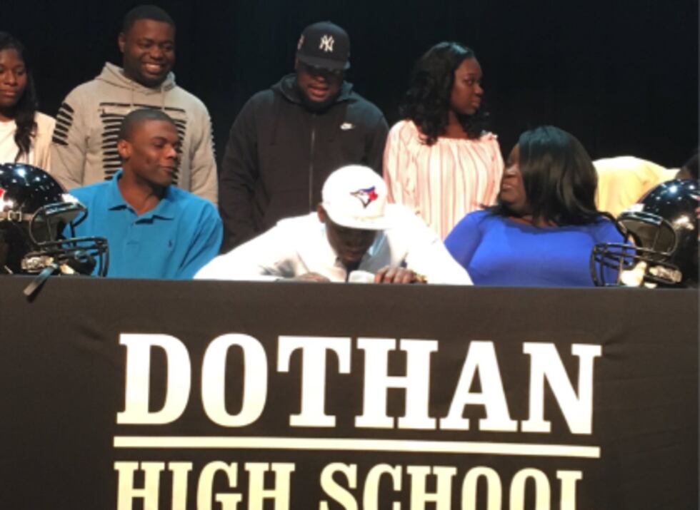 Martin during a recent signing. He was going to play football for a junior college. (Source:...