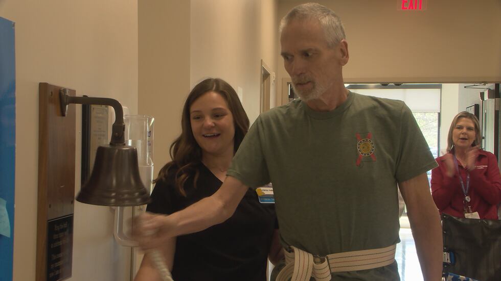 John Gallups rang the discharge bell Friday at Encompass Health Rehabilitation Hospital of...